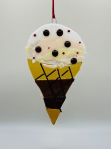 an ice cream cone made out of fused glass